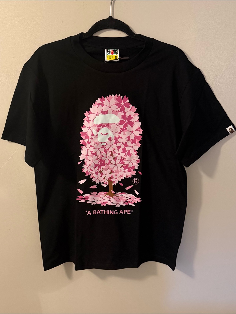 A Bathing Ape Black Art Print Tee with Pink Blossom Graphic